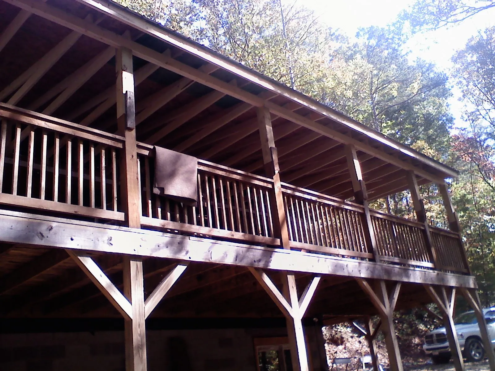 Timber framing under a new elevated porch and deck — Roof Leak Repair in Attleboro Falls by Roofing Brothers